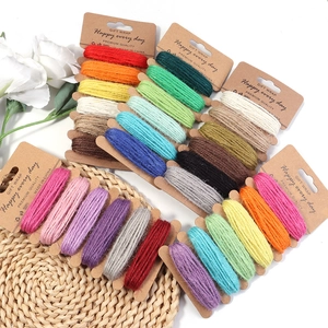 Three-strand braided 2mm colored hemp rope set on kraft cards for DIY crafts and gift wrap