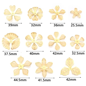 Assorted gold-plated hollow mesh copper flower charms and leaf filigree for DIY jewelry