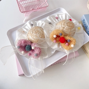 Sweet pet straw hat with colorful pom-poms and white organza bow for cats and dogs