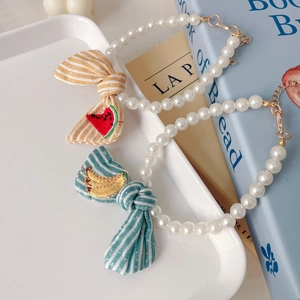 Cute pet pearl necklace with striped bows and embroidered watermelon banana charms