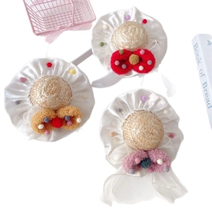 Straw pet sun hats with colorful pompoms, bows and white lace ribbons for small cats and dogs