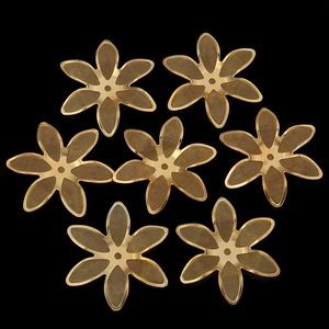 Detailed view of seven golden wire mesh flower charms for DIY jewelry making accessories