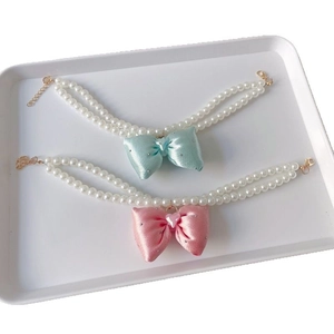 Double-layer pearl pet necklace with pink and mint green silk bows for cats and dogs