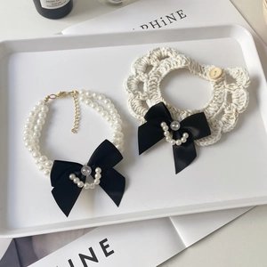 French style pet pearl necklace and woven gold silk collar with black bow tie set