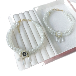 Elegant double-layered pearl pet necklace featuring bee enamel pendants and crystal drops
