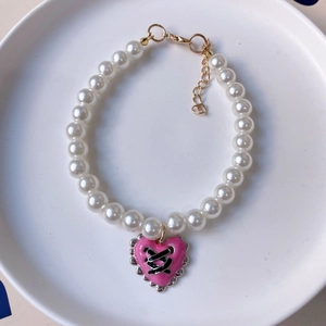 Vintage pearl pet necklace with pink heart pendant and golden adjustable clasp