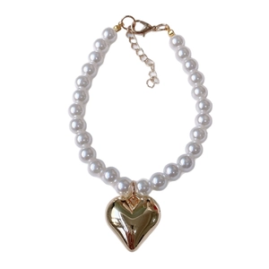 Elegant pearl pet necklace with a large gold heart pendant and adjustable lobster clasp