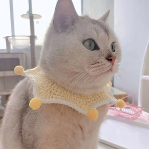 Handmade crochet pet scarf with yellow pom-poms for cats and small dogs