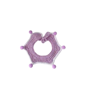 Handmade crochet pet scarf with purple and white stars and plush pom-poms for cats