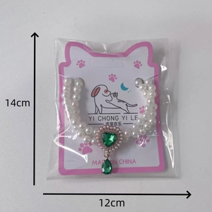 Double-layer pearl pet necklace with green crystal heart and teardrop pendant for cats