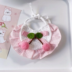 Handmade crochet pet bib with pink cherry design and plaid ruffles for cats and small dogs