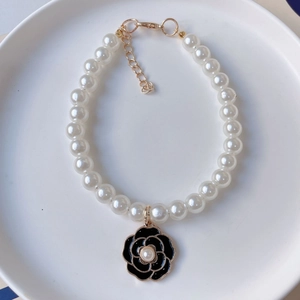 Elegant pet pearl necklace with camellia flower pendant and golden adjustable clasp