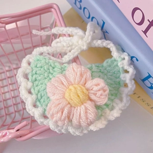 Handmade crochet pet bib with mint green wave pattern and 3D pink flower accessory