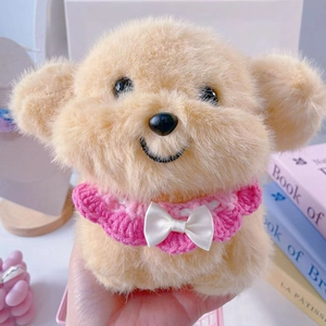 Detailed view of pink crochet lace collar with white bow on plush toy accessory