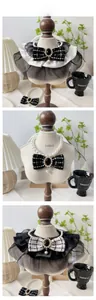 Detail of pet pearl collar with tweed bow and lace trim in elegant black and white