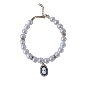 Retro pet pearl necklace with colorful vintage cameo pendant and gold crystal spacers