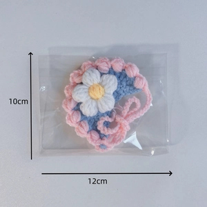 Hand-knitted pet bib with white flowers and pink wavy edges for kittens, size 12x10cm