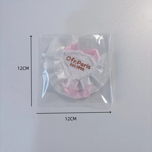 Pink heart-shaped pet bib with white lace ruffles and Ofr. Paris embroidery, 12cm size