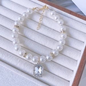 Elegant cat pearl necklace with a vintage square crystal pendant and gold spacers