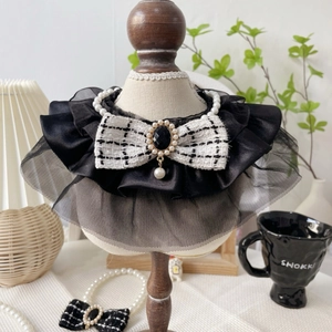 Elegant pet pearl necklace with black and white tweed bow and lace trim for cats and dogs