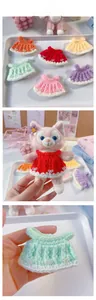 Detailed macro view of colorful crochet doll dresses with bowknots and white scalloped edges