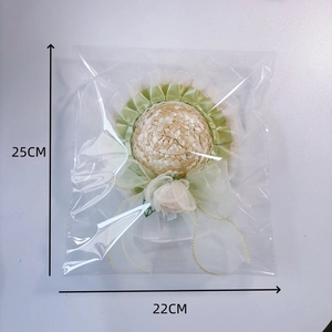 Pet straw hat with light green lace and cream flower ornament for cats and dogs