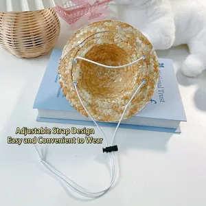 Handwoven pet straw hat with colorful floral accents and adjustable strap for cats and dogs