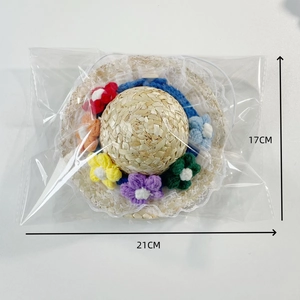 Handmade woven pet sun hat with colorful crochet flowers and lace trim, 21x17cm size