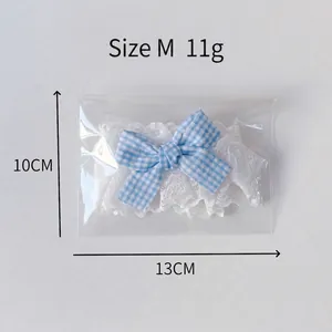 Adjustable blue plaid bow pet collar with white floral lace trim for cats and dogs
