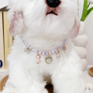 Iridescent pearl pet necklace for cats and dogs with cute charms and pink heart pendant