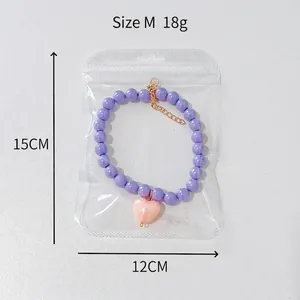 Size M candy colored pet beaded necklace with purple beads and pink heart pendant