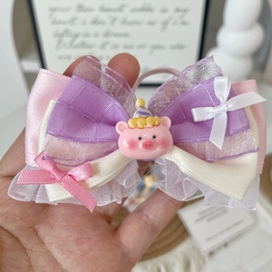 Cute pink and purple bow collar with a cartoon pig mascot for cats and small dogs