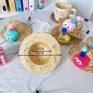 Straw pet sun hat with colorful pom-pom monsters and adjustable strap for cats and dogs