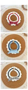 Detail of handmade crochet pet collars with bowknots and wood buttons in three colors