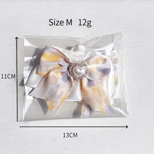 Nœud papillon mignon pour animal avec perle cœur en tissu tie-dye jaune et bleu
