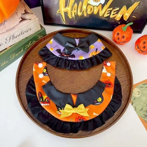 Detail of Halloween pet bibs set with purple bat and orange pumpkin patterns