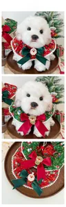 Detail of Christmas pet collar with lace trim, large bow and festive Santa reindeer badge