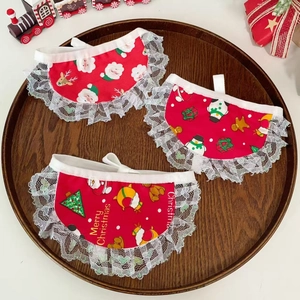 Three-piece Christmas pet bib set with lace edges and festive Santa prints on wood tray