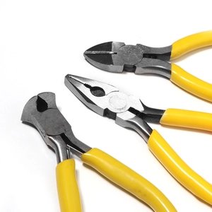 Close-up of a 3-piece mini plier set with yellow non-slip handles and steel heads