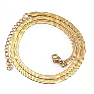 Detailed view of golden stainless steel snake chain with lobster clasp and extension