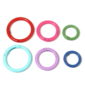 Detail of colorful spring O-rings in six vibrant matte colors for DIY bag accessories