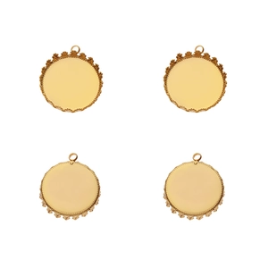 Macro view of gold crown-edged pendant trays for DIY jewelry making and time gem settings