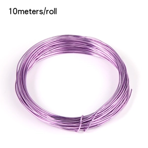 Macro shot of 10-meter purple anodized aluminum wire roll for DIY jewelry making