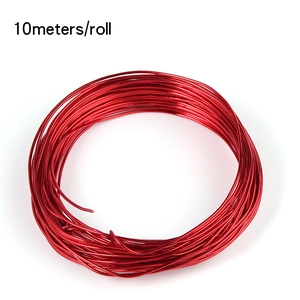 Macro shot of 10-meter red aluminum craft wire roll with metallic finish for DIY jewelry