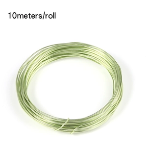 Close-up of light green 10-meter aluminum craft wire coil for DIY jewelry making