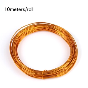 Macro shot of 10-meter gold-plated aluminum craft wire roll for DIY jewelry making