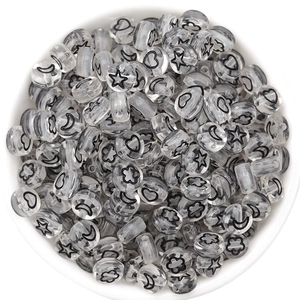 Clear acrylic flat round beads with black star moon heart and flower motifs for DIY