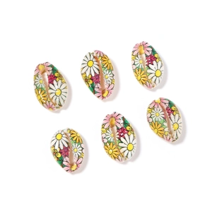 Set of six colorful floral cowrie shells with daisy patterns for DIY bohemian jewelry