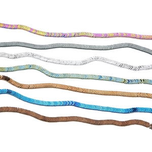 Close-up of arrow hematite beads in seven metallic colors for DIY jewelry making
