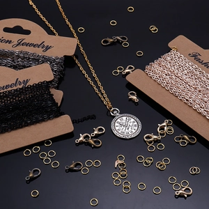 Kit de joyería DIY con cadenas de cruz planas de 2x3mm y cierres de langosta en fondo negro